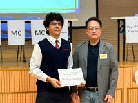 Team Captain Arsam Saberi receiving the Best Debater award